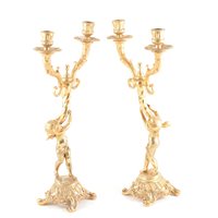 Lot 119 - A pair of continental lacquered brass twin-light candelabra, similarly designed, 42cm (2)