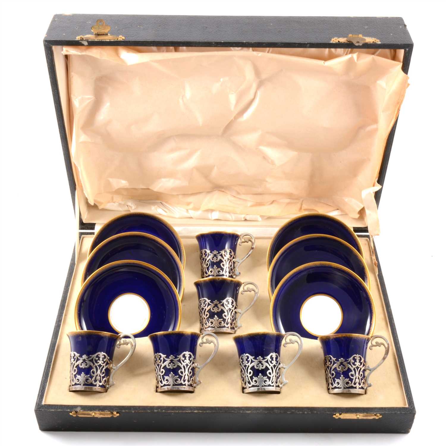 Lot 39 - A set of six Aynsley bone china coffee cans and saucers, the cans with silver frames
