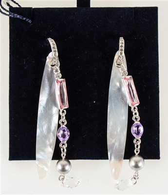 Lot 195 - A pair of Swarovski drop earrings, pink, white and mauve crystals behind a mother-of-peal baton