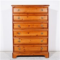 Lot 299 - Modern stained pine chest of drawers, ...
