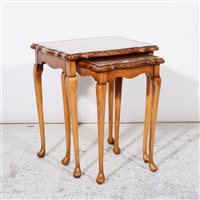 Lot 267 - Nest of two reproduction stained beechwood occasional tables, ...