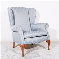 Lot 285 - Traditional style wing-back easy chair, ...
