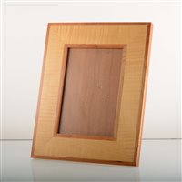 Lot 682 - A rectangular satin birch and walnut photograph frame by David Linley