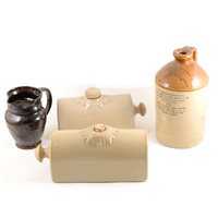Lot 64 - Stoneware flagons, stoneware hot water bottles, and other stoneware