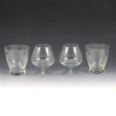 Lot 57 - A quantity of etched and cut table glass, to include eight etched glass rinsers, a jug and set of six grape and vine etched squat goblets, six heavy goblets, six brandy balloons, six sherry glasses