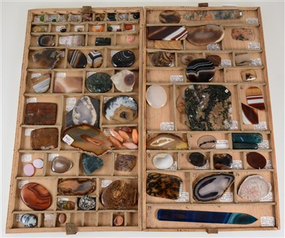 Lot 214 - Two trays of polished gemstone materials, mainly agates, moss agate, banded agate, sard onyx, carnelion, jasper, agate paper knives, two small mocha stones, etc