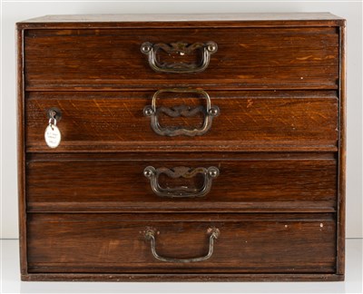 Lot 212 - A collectors cabinet, four drawers, 39cm x 31cm x 26cm, side lock with original key.