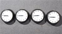 Lot 335 - Four plastic framed wall clocks, dials signed Chloride Gent