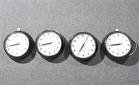 Lot 336 - Four plastic framed wall clocks, dials signed Chloride Gent