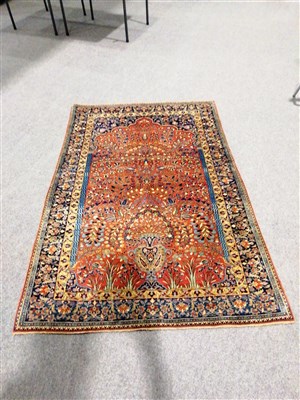 Lot 475 - Tabriz prayer rug with flower filled urn, red ground, border within guards, 196 x 112cm.