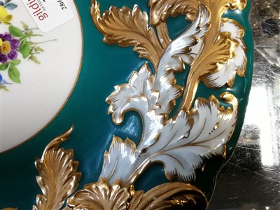Lot 34 - A Meissen hand painted dish with floral centre, turquoise green border with gilded acanthus leaf decoration around scalloped rim, impressed C113, 30cm