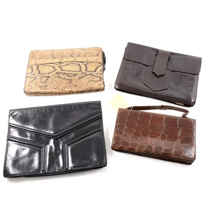 Lot 176 - Two Yves Saint Laurent vintage envelope clutch bags in brown and black, a 1920s crocodile clutch bag and another with zip.