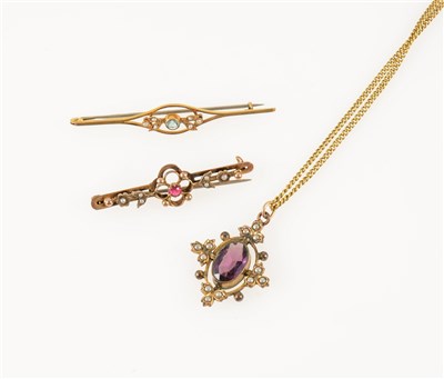 Lot 272 - Three pieces of vintage jewellery, a purple paste pendant surrounded with seed pearls on a curb link chain