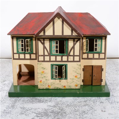 Lot 99 - Tri-ang dolls house, with furniture, and a Mobo ride on horse, (2).