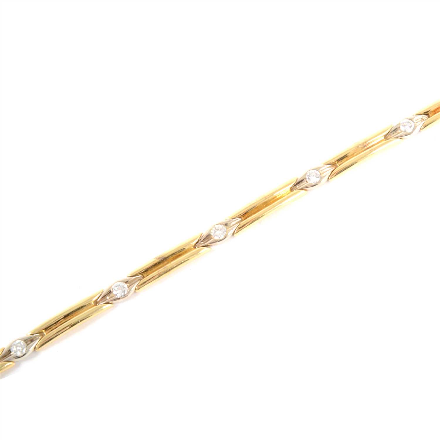 Lot 260 - An 18 carat gold bracelet set with seven diamonds.