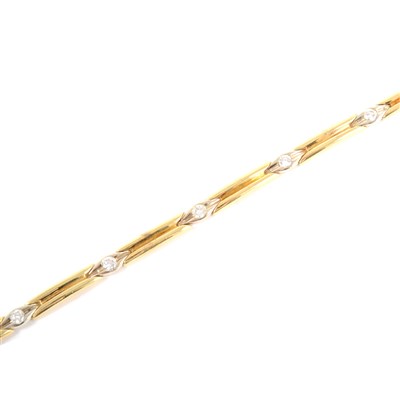 Lot 260 - An 18 carat gold bracelet set with seven diamonds.