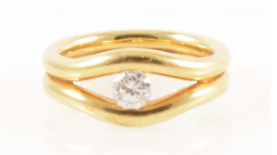 Lot 183 - An 18 carat yellow gold ring set with a diamond.
