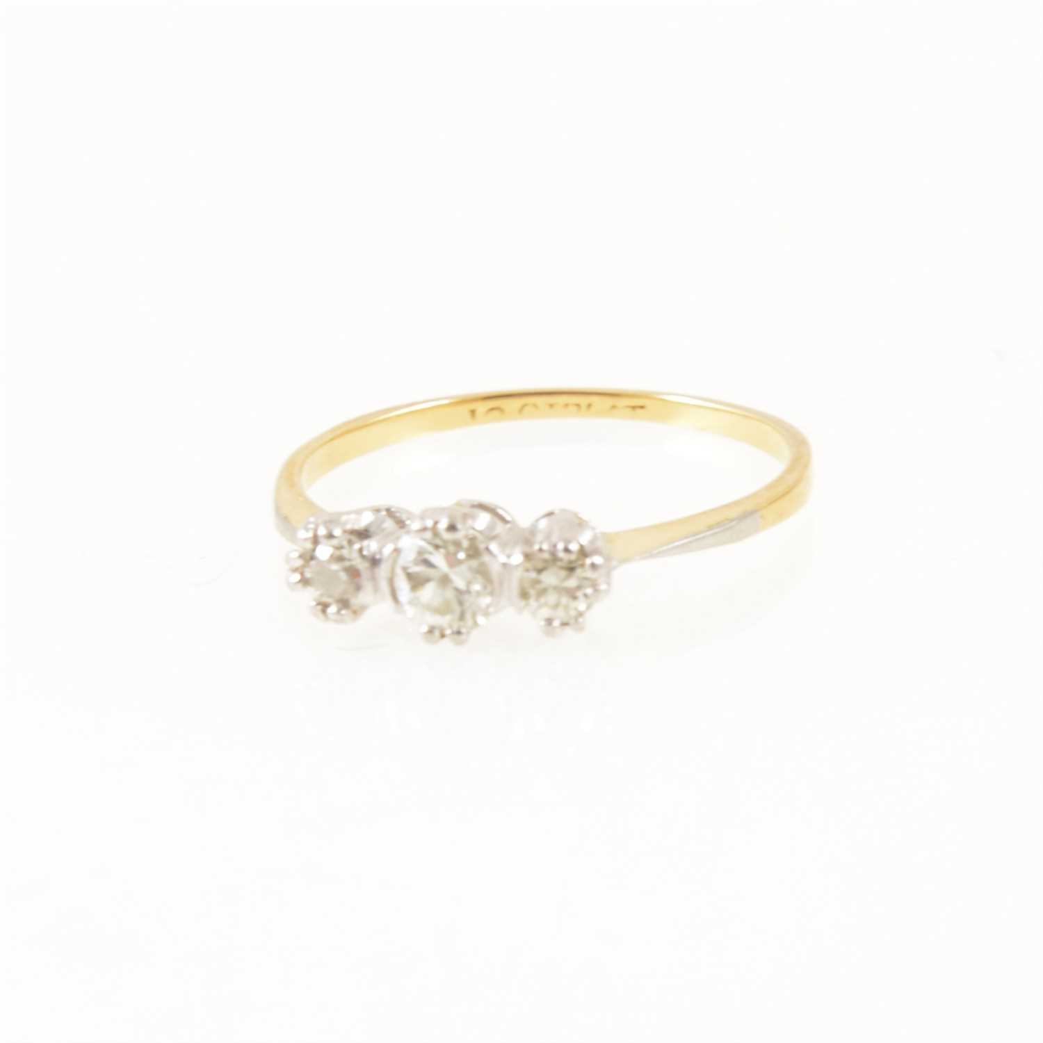 Lot 219 - A diamond three stone ring