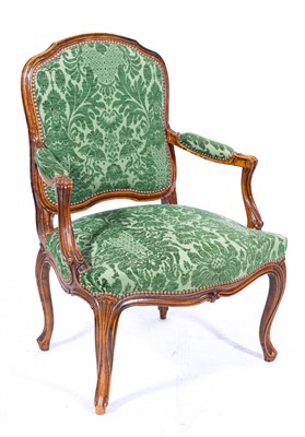 Lot 474 - A Louis XV style stained wood fauteuil