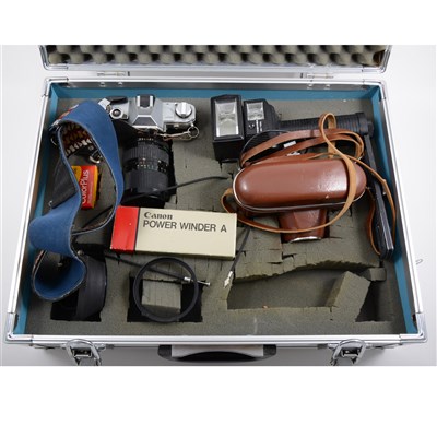 Lot 116 - Canon AT-1 SLR camera with accessories, in hardshell case, and a Russian vintage camera