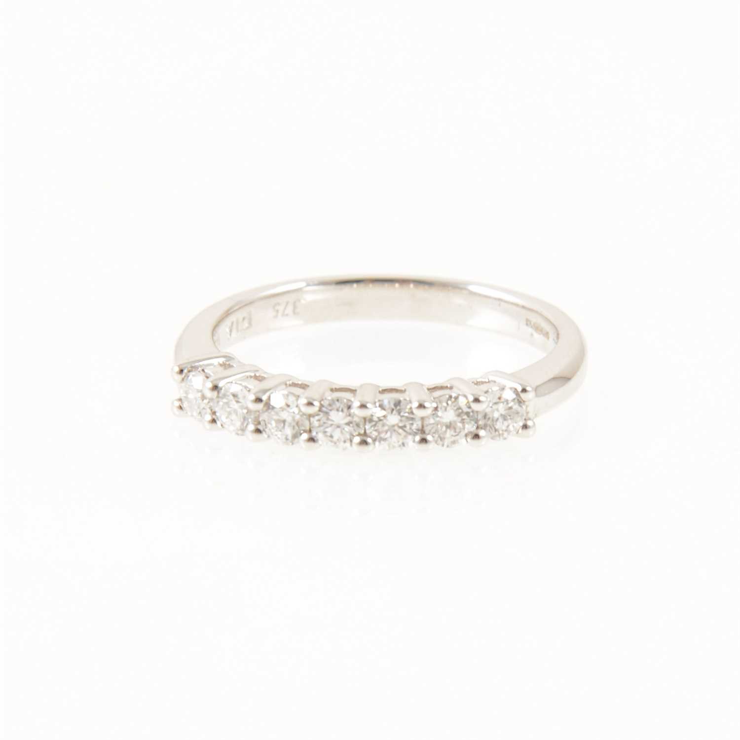Lot 224 - A diamond half eternity ring, seven brilliant cut diamonds, 9 carat white gold mount