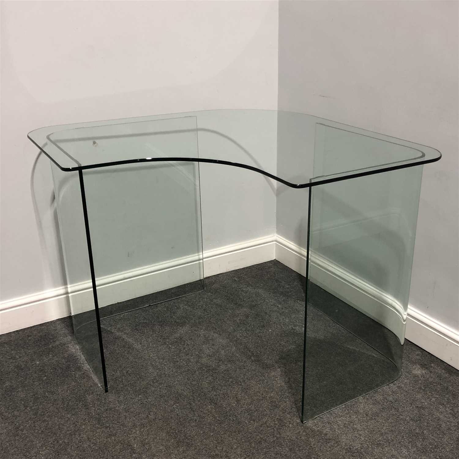 Lot 459 - A late 20th Century glass corner desk