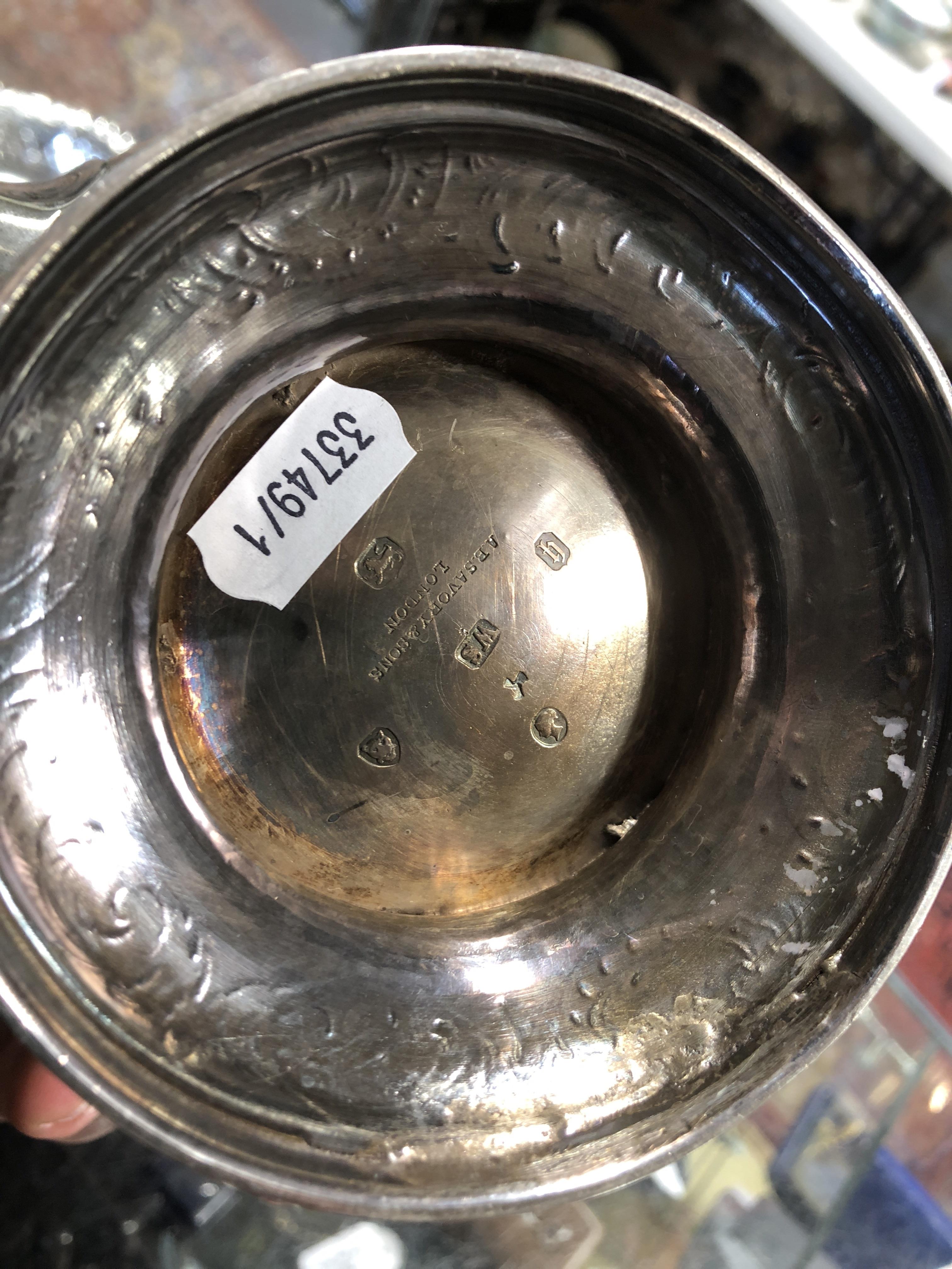 Lot 238 - A silver teapot by A B Savory & Sons