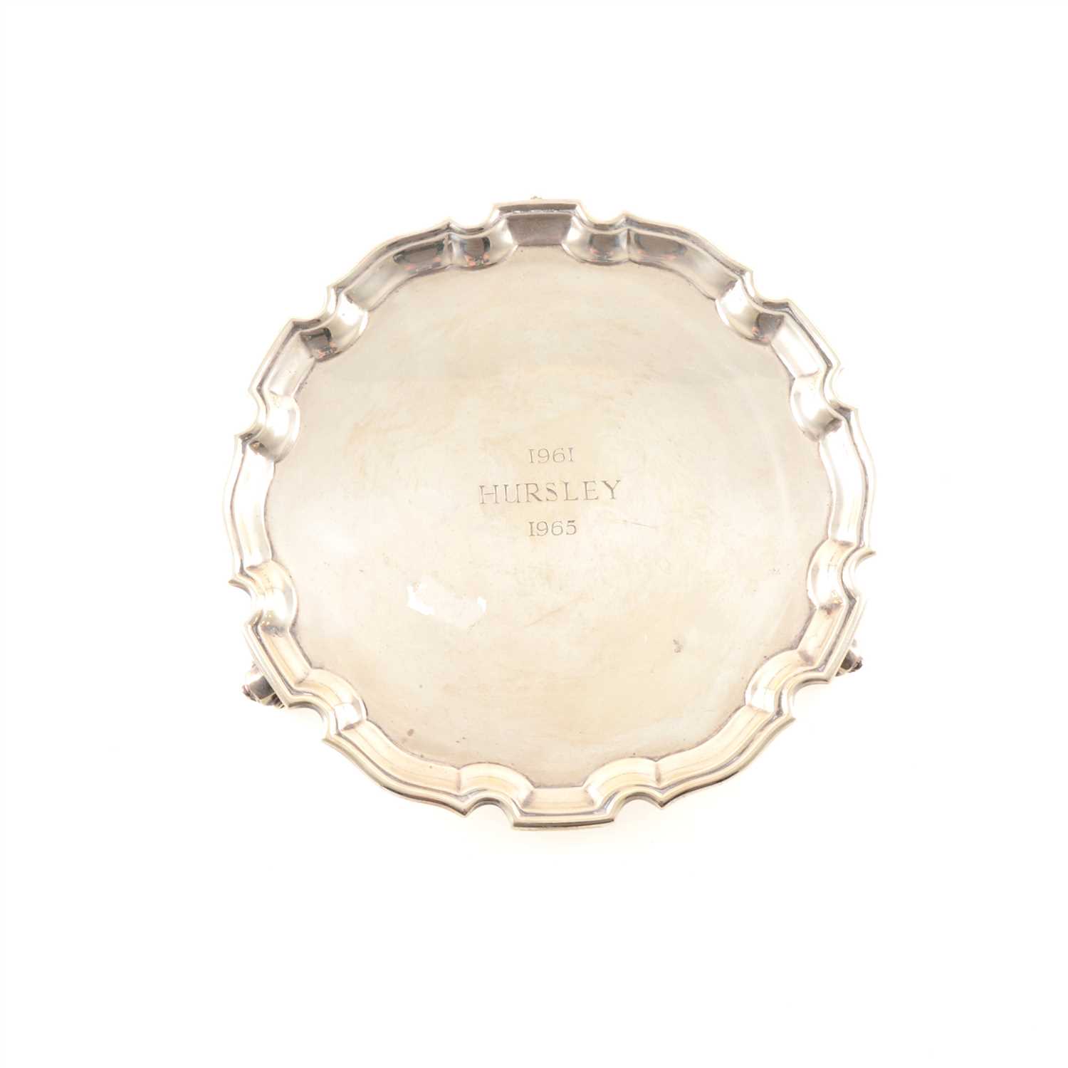 Lot 245 - A small silver waiter by Carrington & Co, with stepped Chippendale border, engraved to centre, London 1962, 20.5cm diameter, weight approx. 12.9oz.