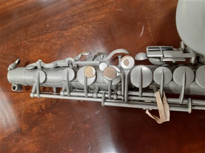 Lot 62 - A trumpet, cornet, and alto saxophone, with various mutes.