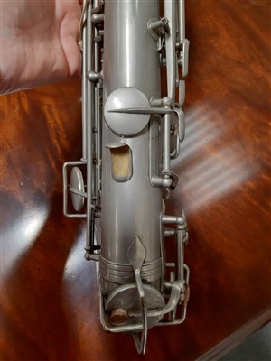 Lot 62 - A trumpet, cornet, and alto saxophone, with various mutes.