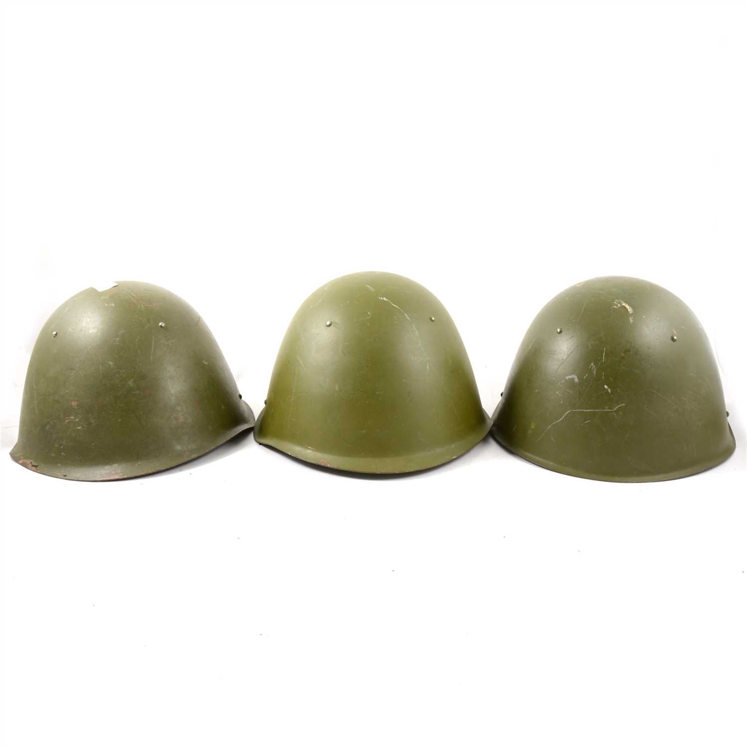 Lot 150 - Three Russian army steel helmets.