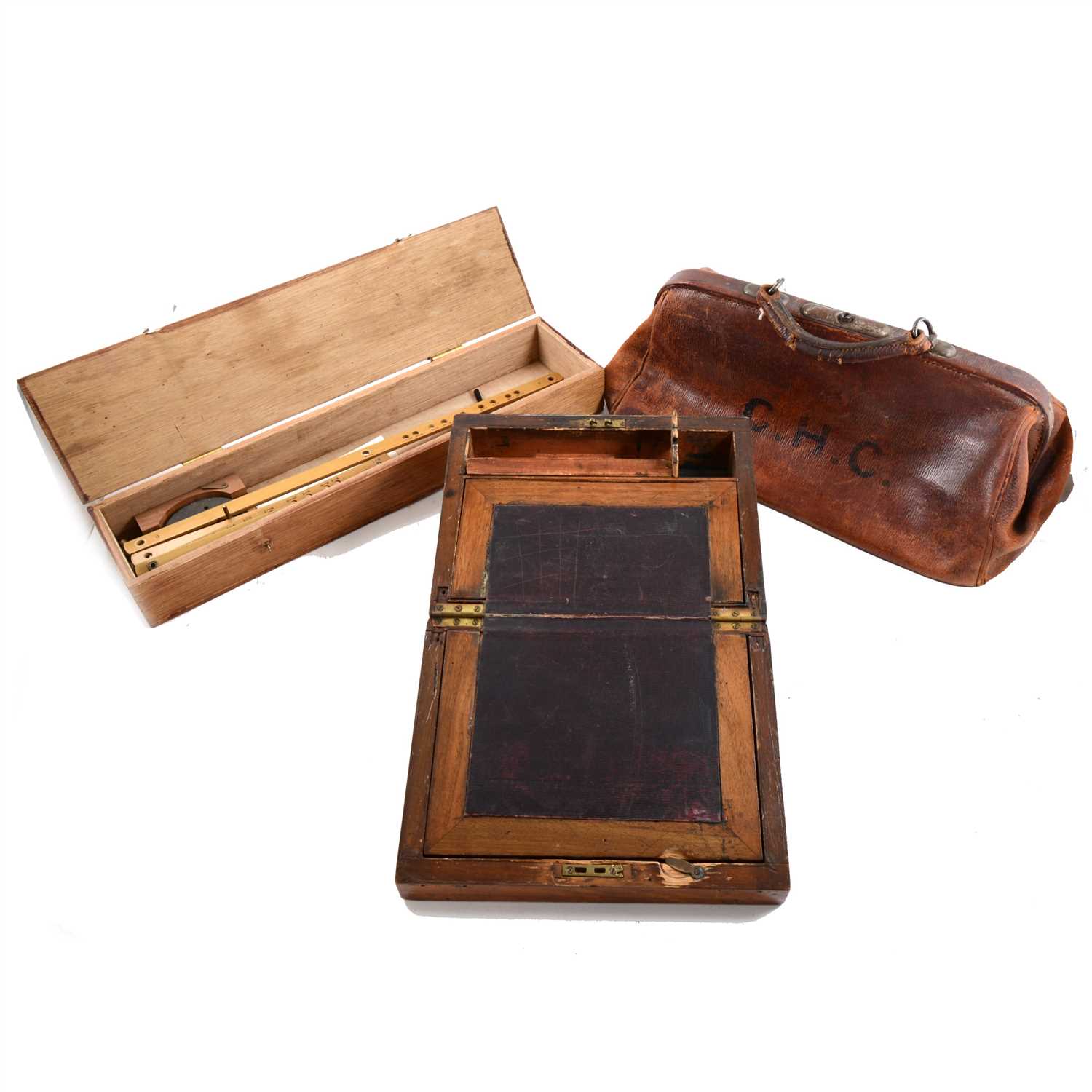 Lot 66 - Edwardian leather Gladstone bag, three writing boxes, and a pantograph, etc.