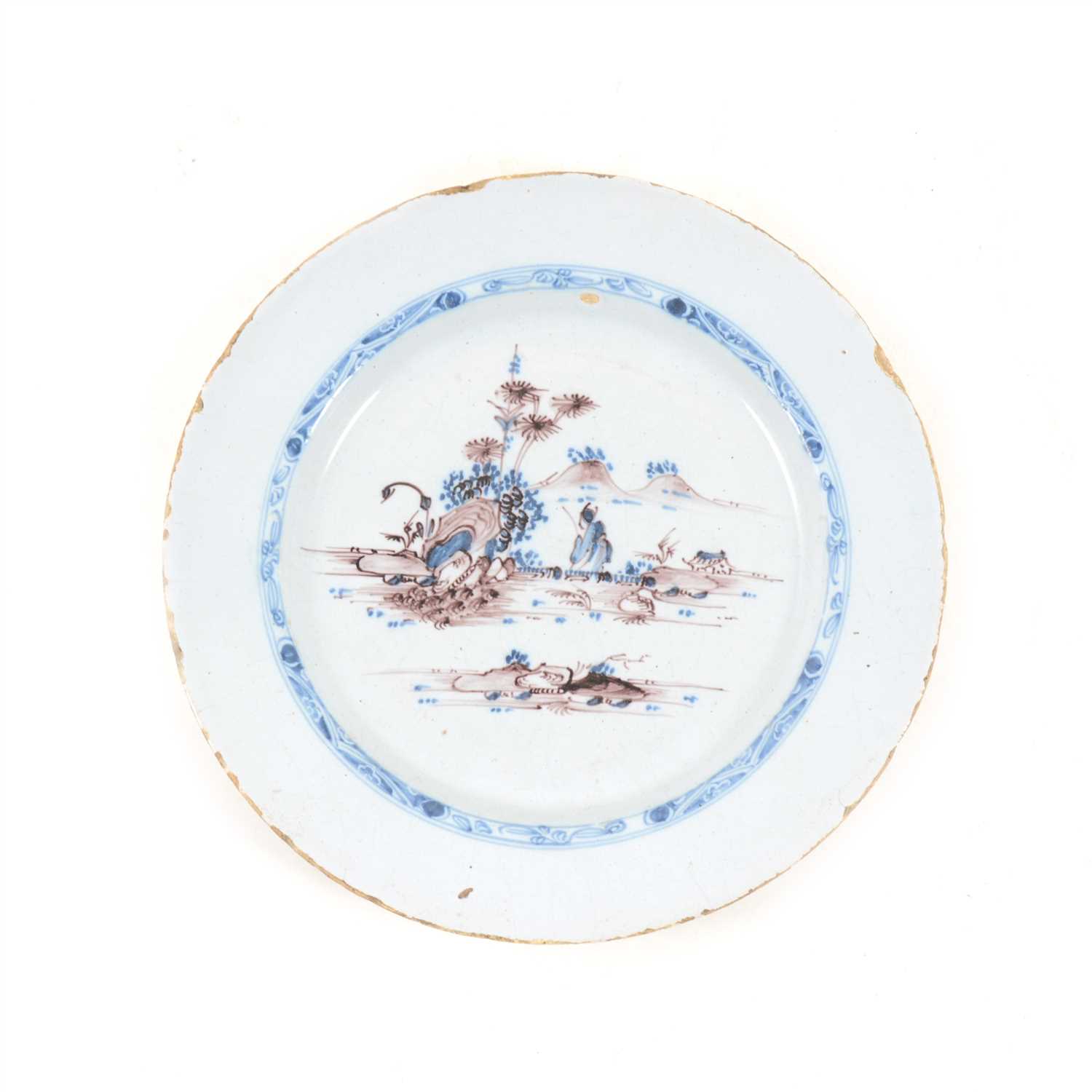 Lot 26 - Dutch Delft plate, mid 18th Century, painted with a Chinese landscape, ...