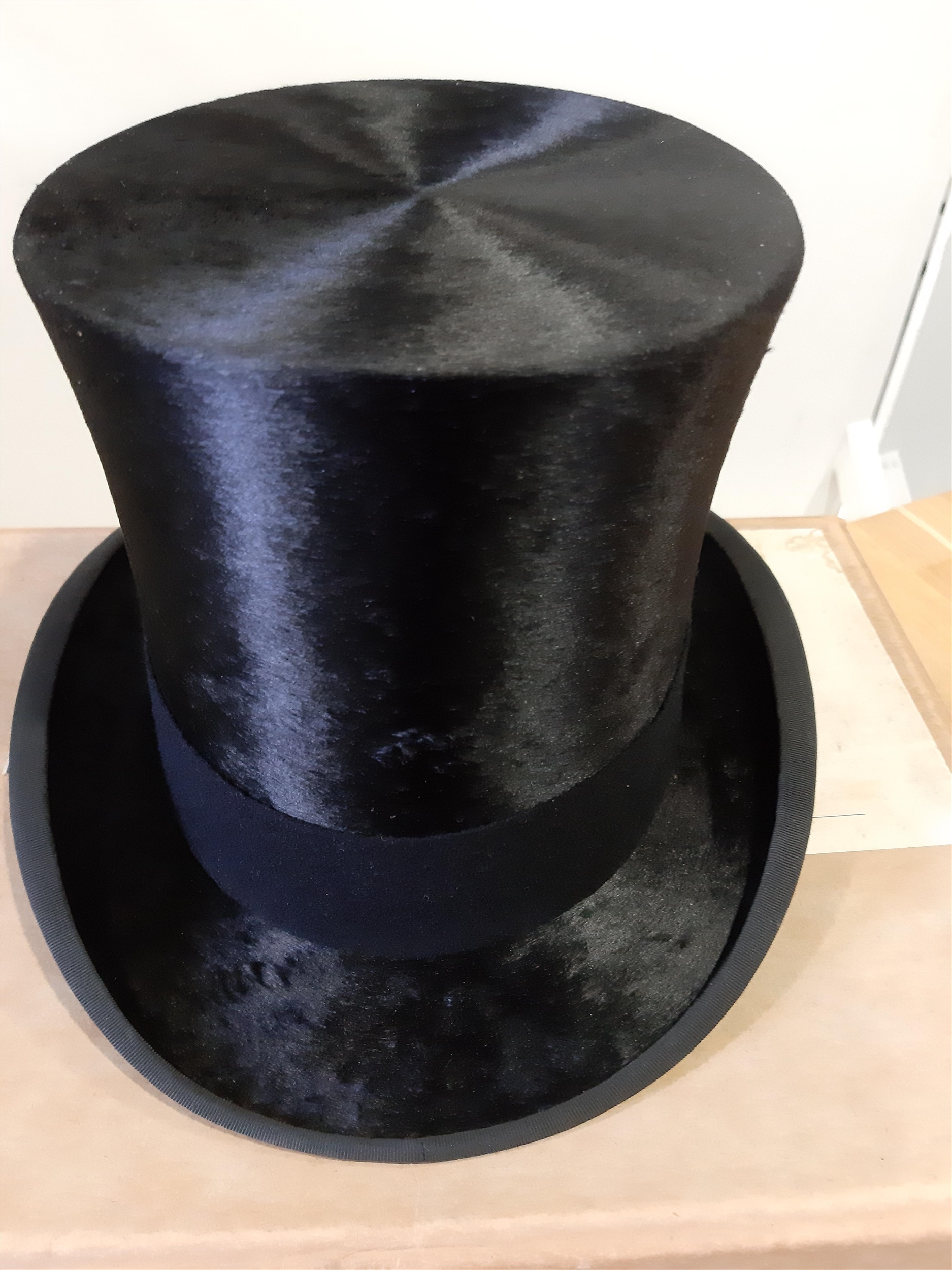 Lot 68 - Black silk top hat, James Lock & Co, London,