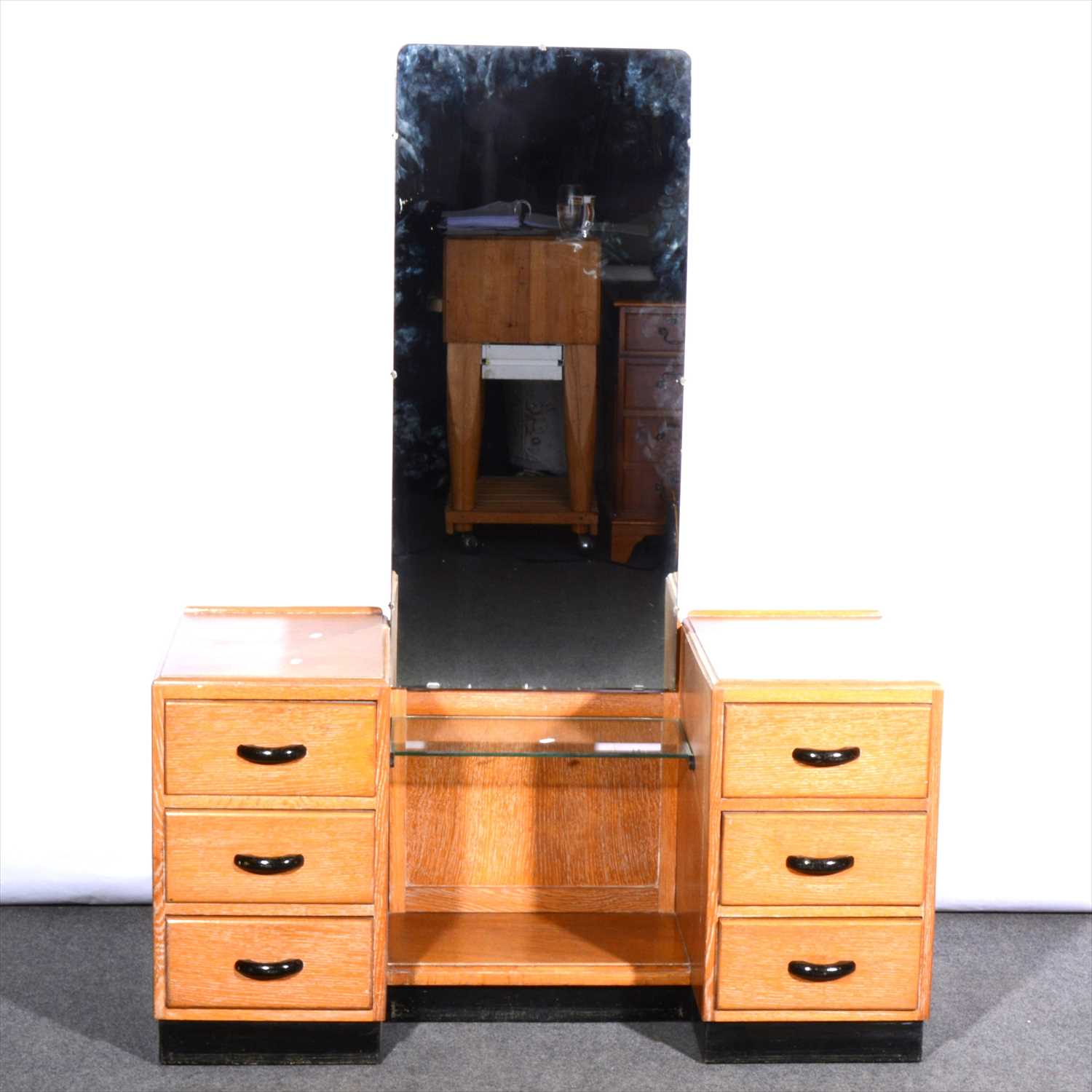 Lot 537 - An oak utility dressing table, 1940s, with similar stool.