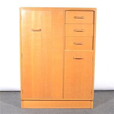 Lot 336 - A G-Plan light oak compactum, ...