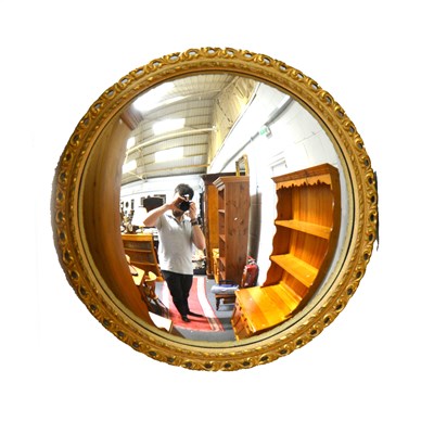 Lot 392 - Convex mirror, pierced gilt frame