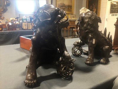 Lot 122 - Pair of large bronze Buddhist lion censers, probably 19th Century.