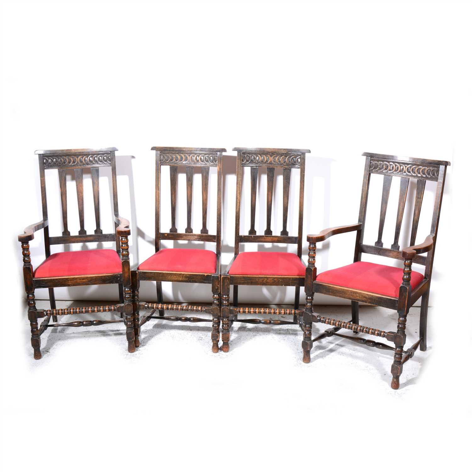 Lot 334 - Set of six 1920s oak slat-back dining chairs.