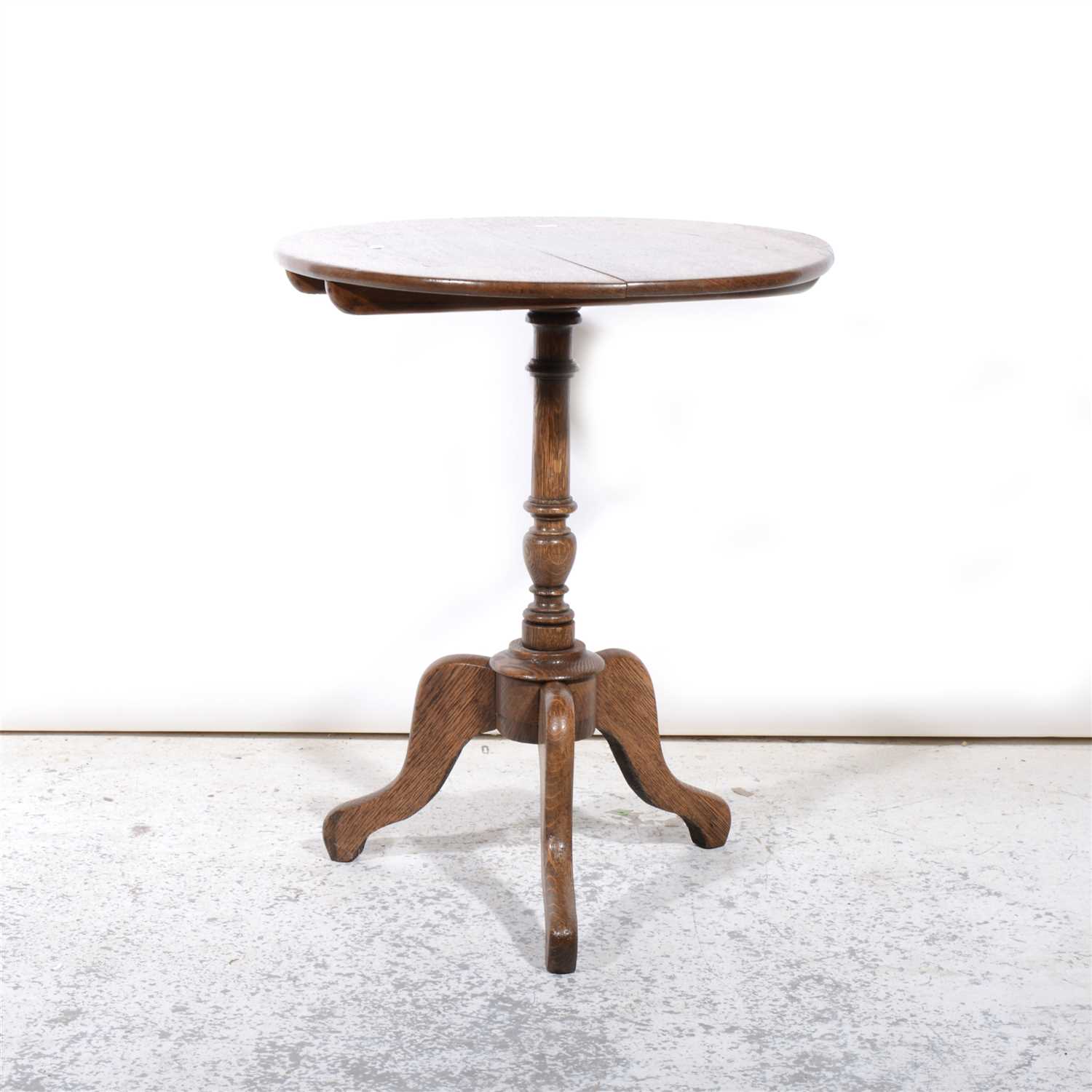 Lot 380 - Oak tripod table, circular top.