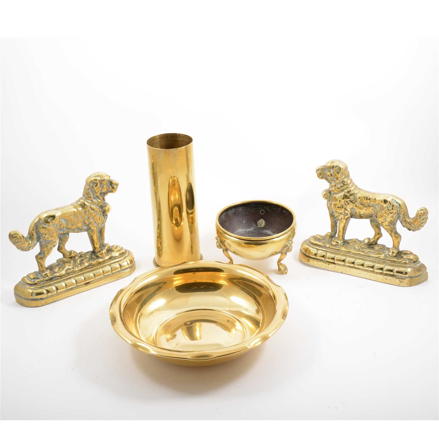 Lot 92 - Quantity of brass and copper ware, including two shellcase vases, doorstops cast as dogs, etc.