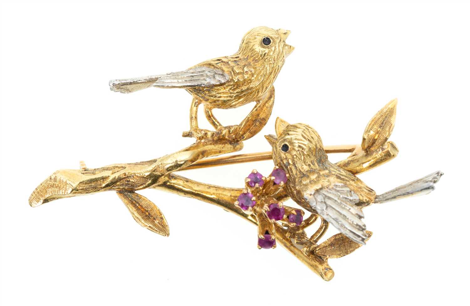 Lot 160 - An 18 carat gold and ruby bird brooch.