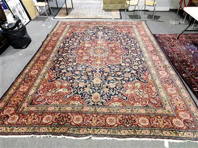 Lot 435 - A Tabriz pattern carpet