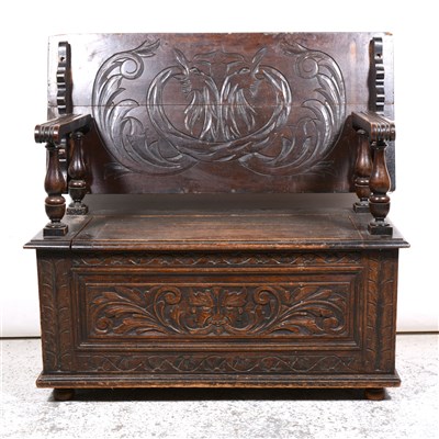 Lot 496 - Late Victorian carved oak monk's bench, 107cm.