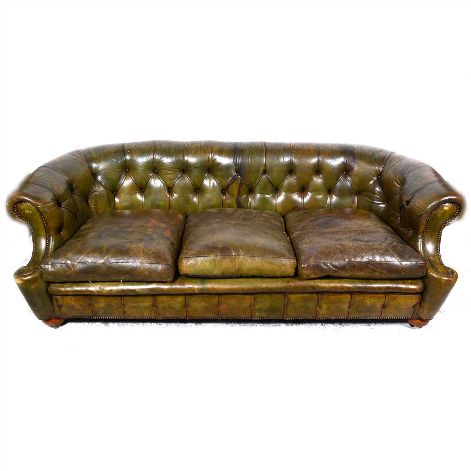 Lot 486 - Button leather Chesterfield settee, scrolled ends, 217cm.