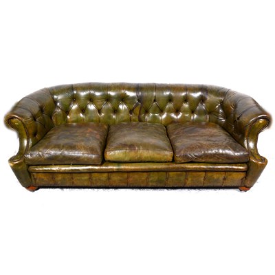 Lot 486 - Button leather Chesterfield settee, scrolled ends, 217cm.