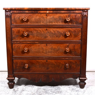 Lot 471 - Early Victorian mahogany chest of drawers, rectangular top, four long graduating drawers, with turned handles, flanked by carved corbels, turned legs, width 110cm.