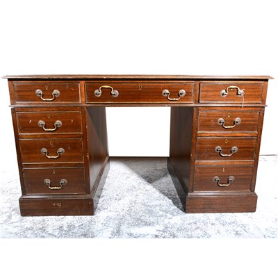 Lot 324 - A reproduction mahogany finish pedestal desk