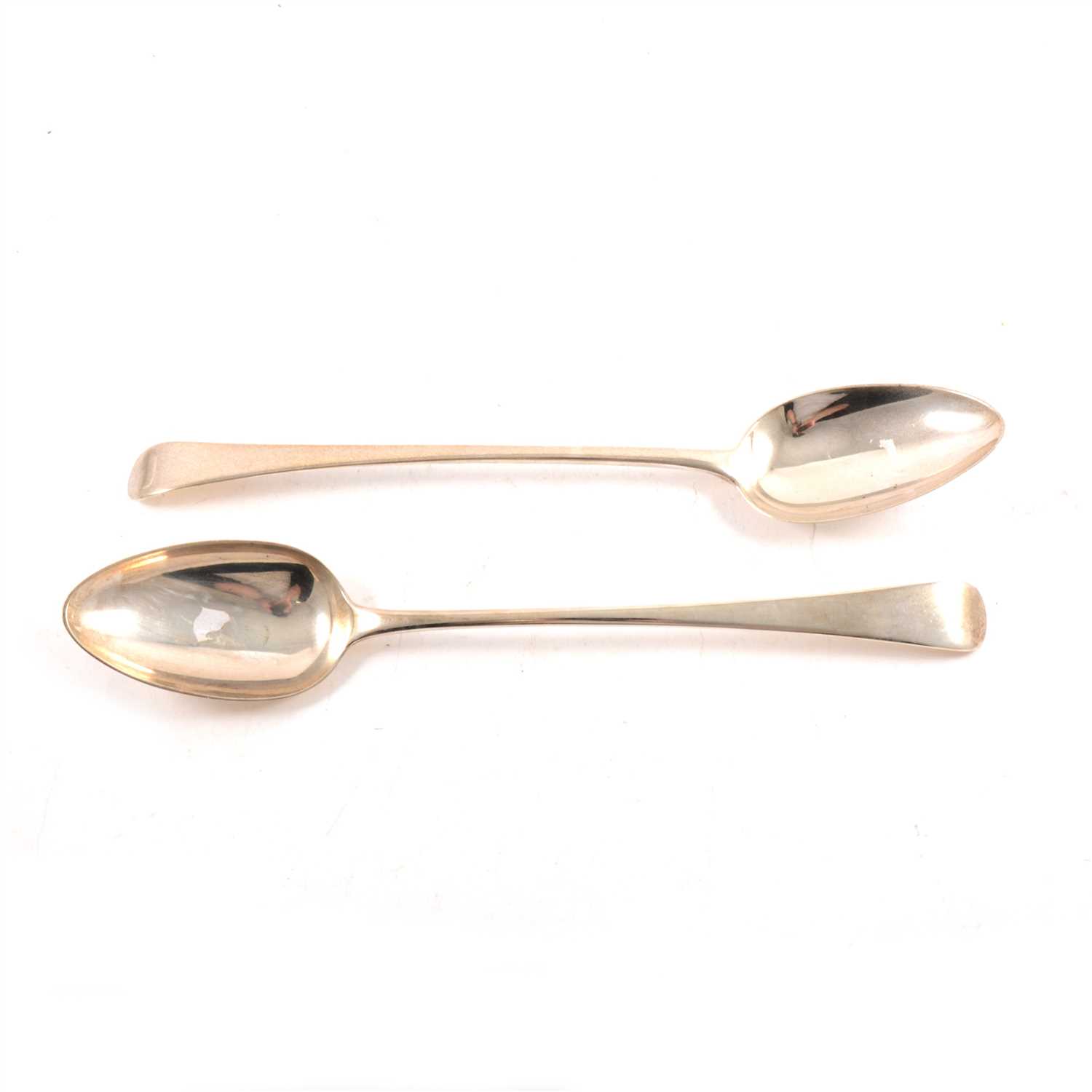 Lot 175 - Two Georgian silver basting spoons by Thomas Hayter