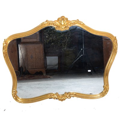 Lot 289 - A contemporary gilt composition wall mirror, ...
